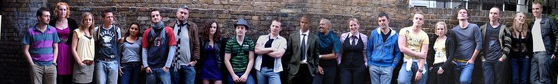 The cast of Rent, with Paul Cozens seventh from the left